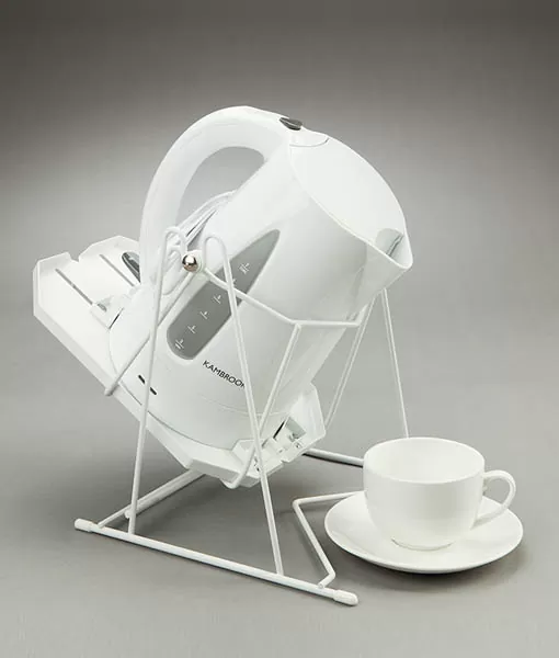 A tea kettle holder that helps pour hot water